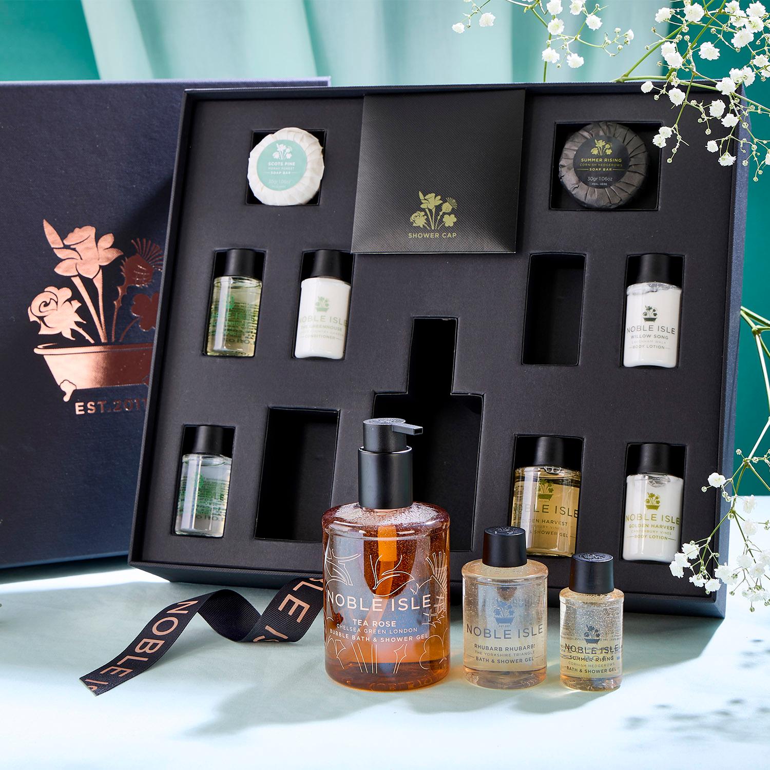 The Mayfair Collection, a gift set of 12 products in a beautiful square gift box with flowers.